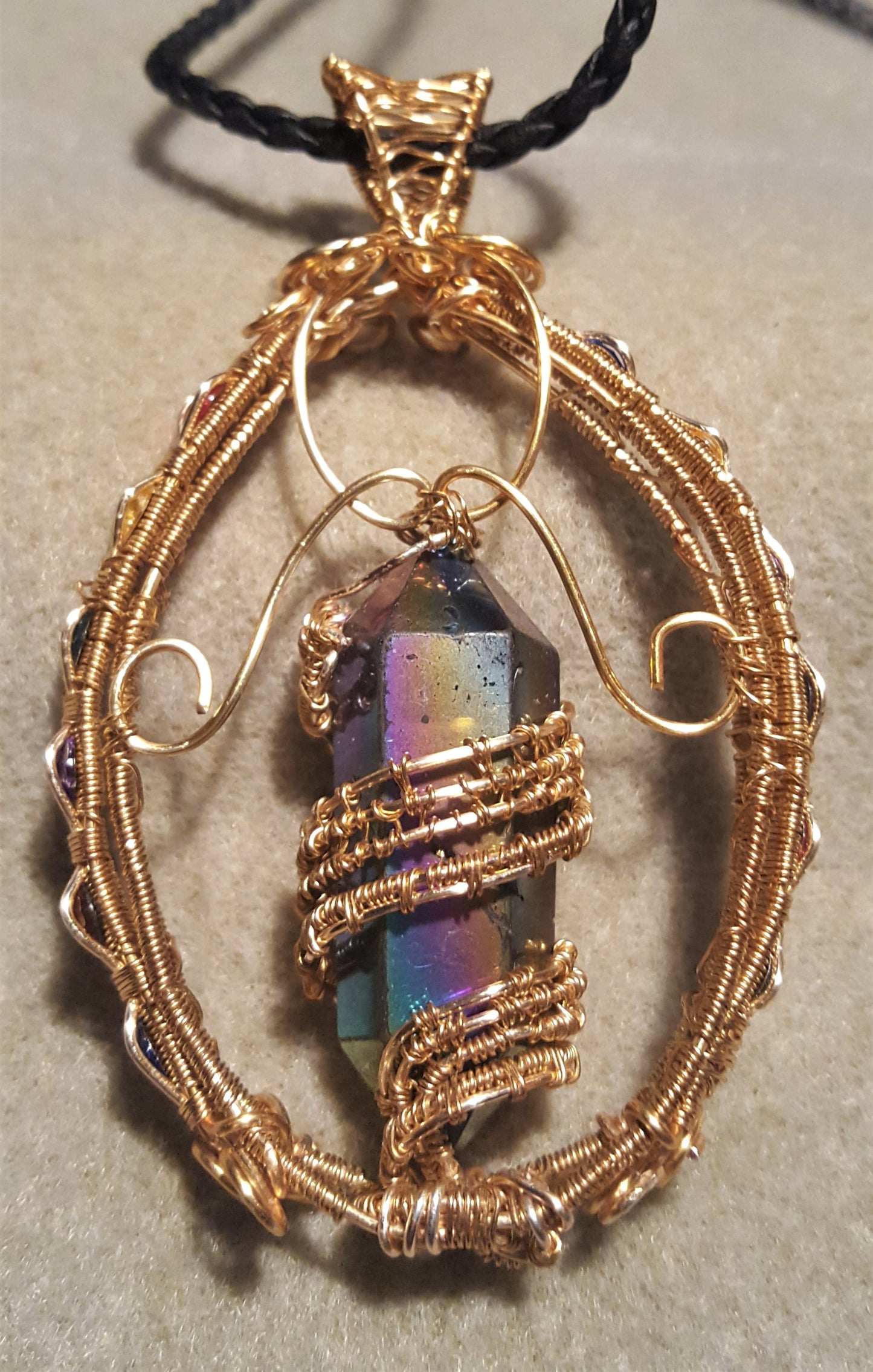 Gold Suncatcher With An Iridescent Crystal Point