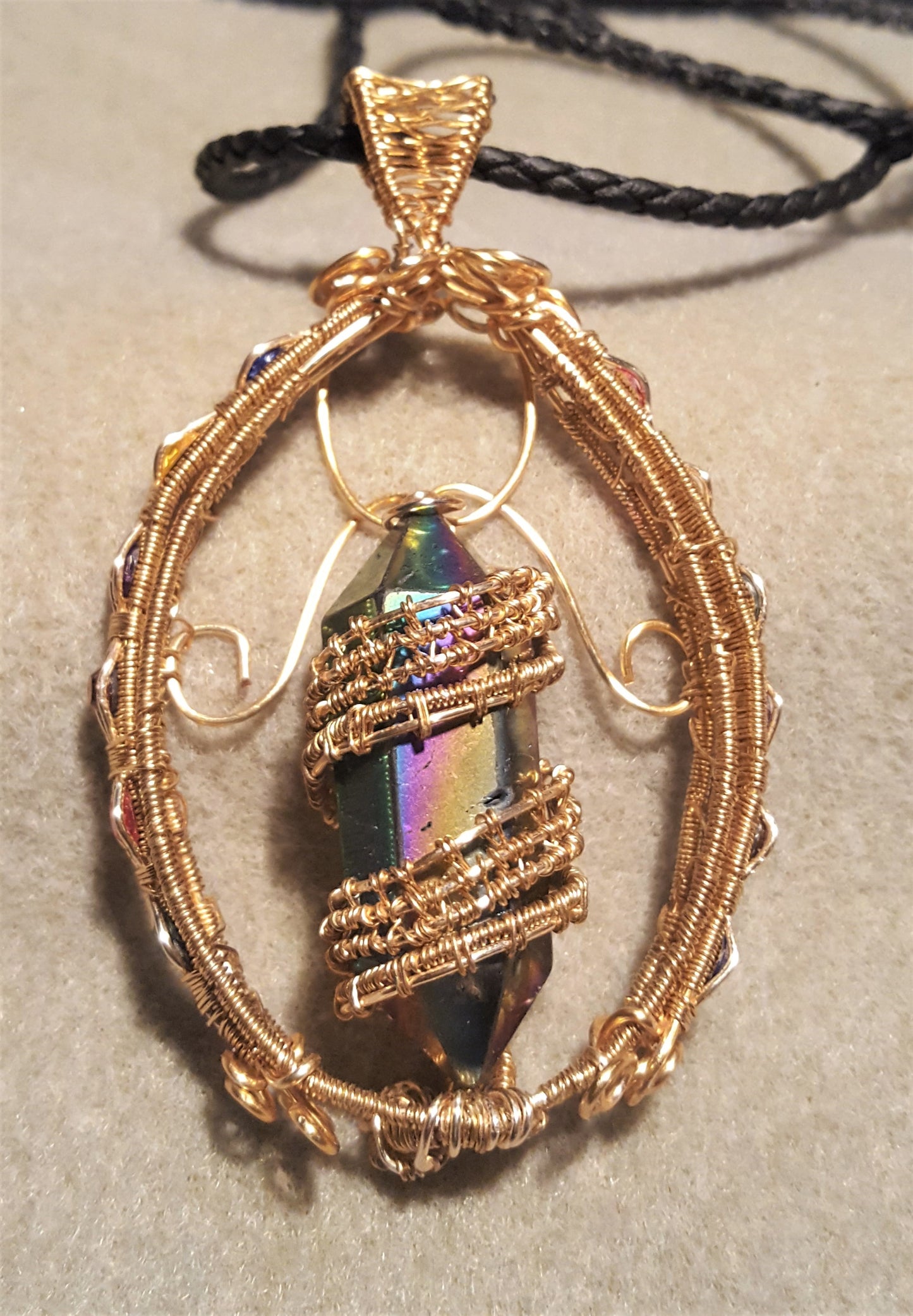 Gold Suncatcher With An Iridescent Crystal Point